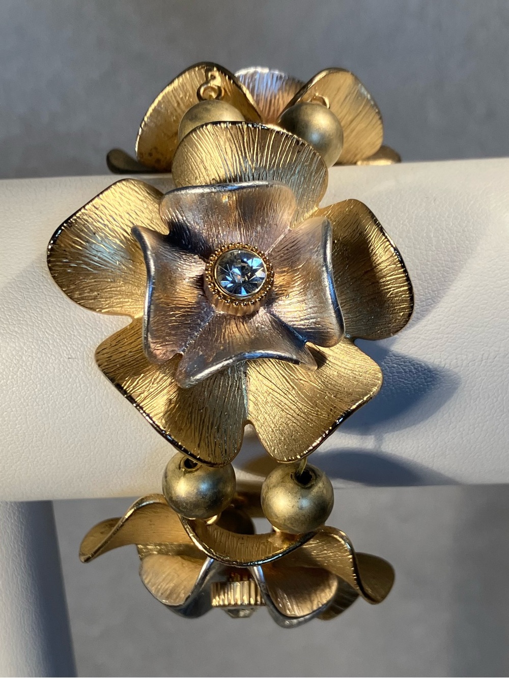 Adele 1 bracelet arm party! Sculptural floral stretch in brushed gold & silver